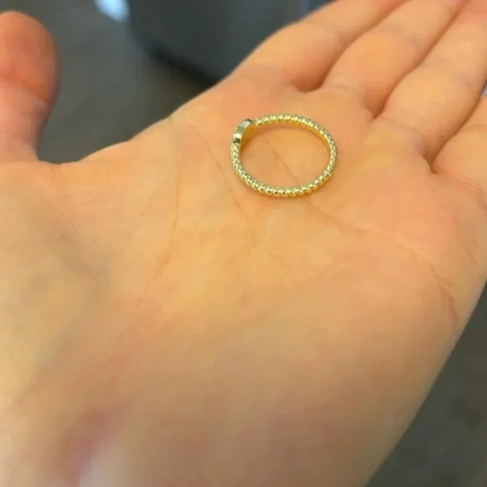 The Inaya Gold twist thin dainty braided ring Sz 6 stainless steel tarnish free